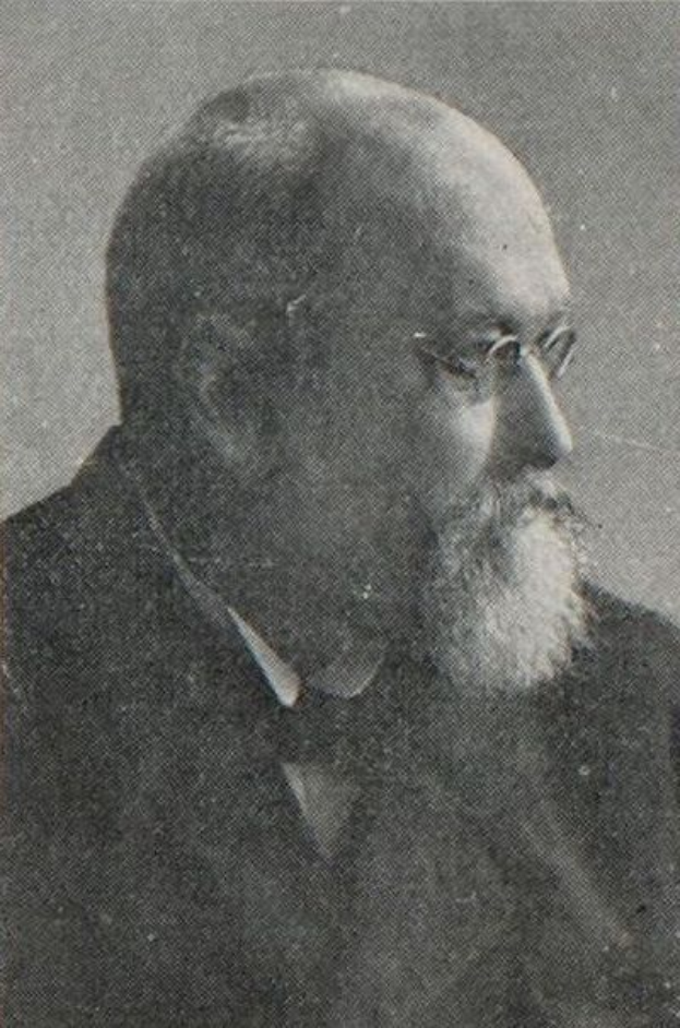 Ein älterer Mann mit Bart, der einen Anzug und eine Brille trägt, in einem Schwarz-Weiß-Foto mit dem Text "Alter Mann" unten.