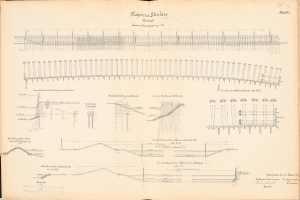Ein aufgeschlagenes Buch mit einer detaillierten Zeichnung einer Bahnschiene und eines Bahnsystems, begleitet von Text und Illustrationen.