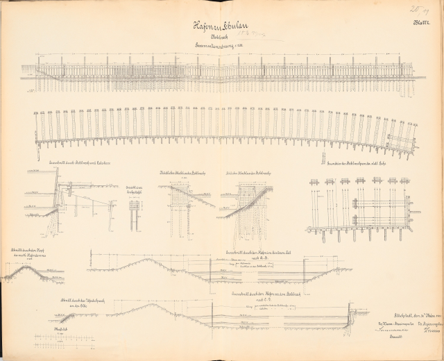 Ein aufgeschlagenes Buch mit einer detaillierten Zeichnung einer Bahnschiene und eines Bahnsystems, begleitet von Text und Illustrationen.