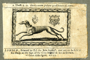 Ein altes Buch mit einer Zeichnung eines Greyhounds in Laufposition, Kopf hoch erhoben und Ohren gespitzt, mit dekorativem Text auf dem Cover.