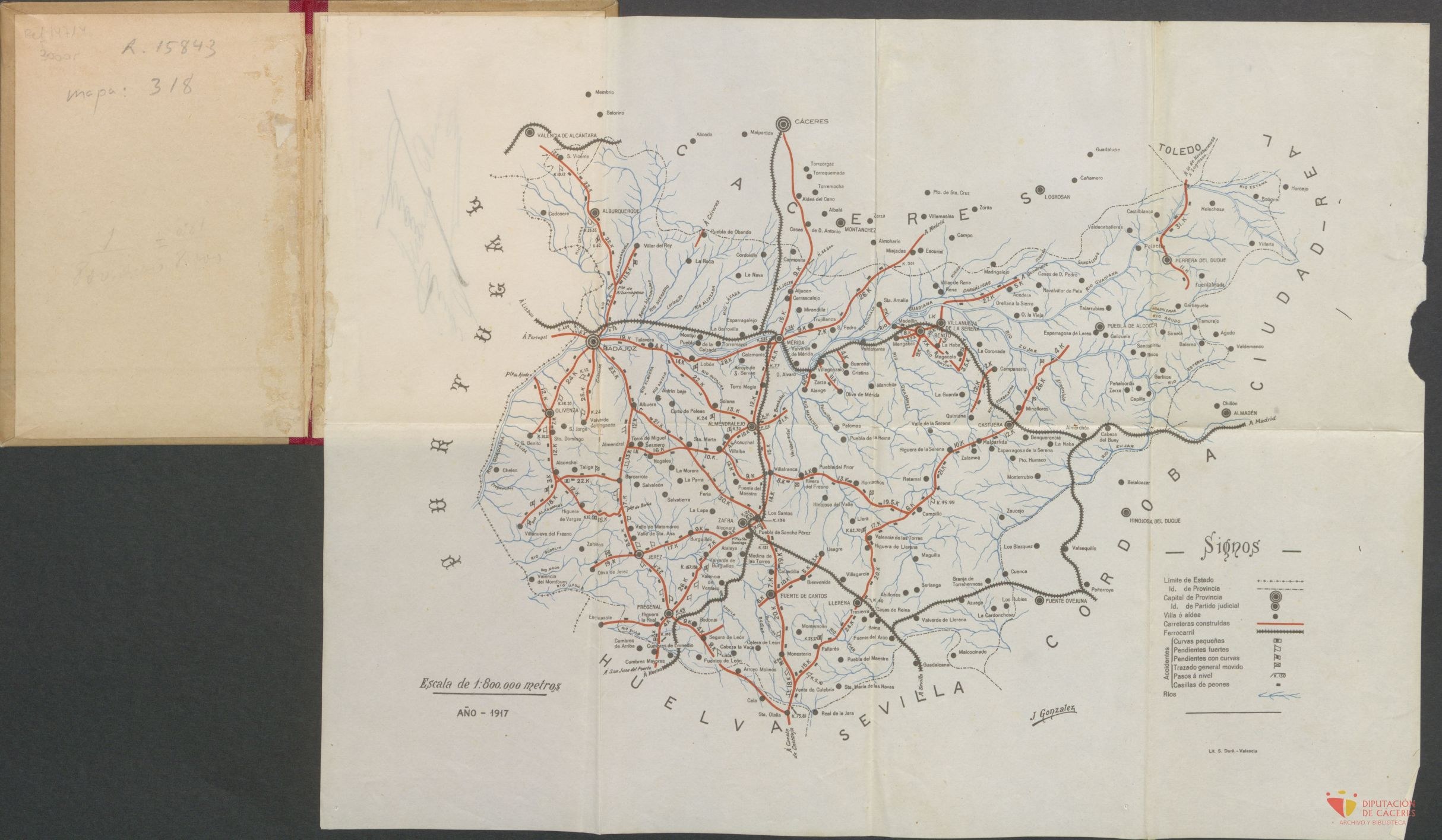 Offenes Buch mit detaillierter Stadtkarte, Straßen, Autobahnen und Text mit Bevölkerungsangaben, Sehenswürdigkeiten und Punkten von Interesse.