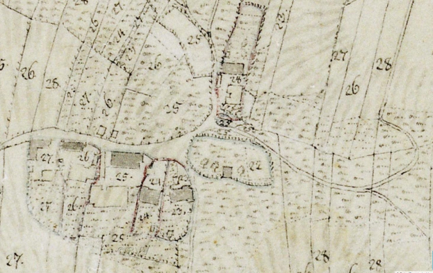 Detailierte alte Stadtkarte zeigt Gebäude, Straßen und Text mit einem vorgeschlagenen Entwicklungsprojekt unten.