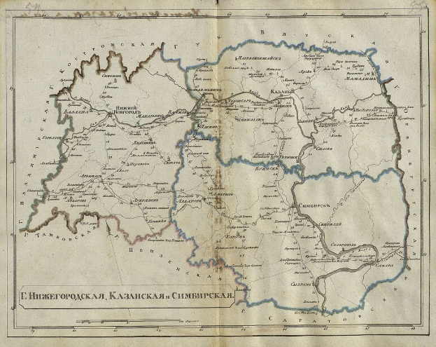 Ein altes Buch mit einer detaillierten Karte der Ukraine, das Provinzen und Städte zeigt, begleitet von beschreibendem Text.