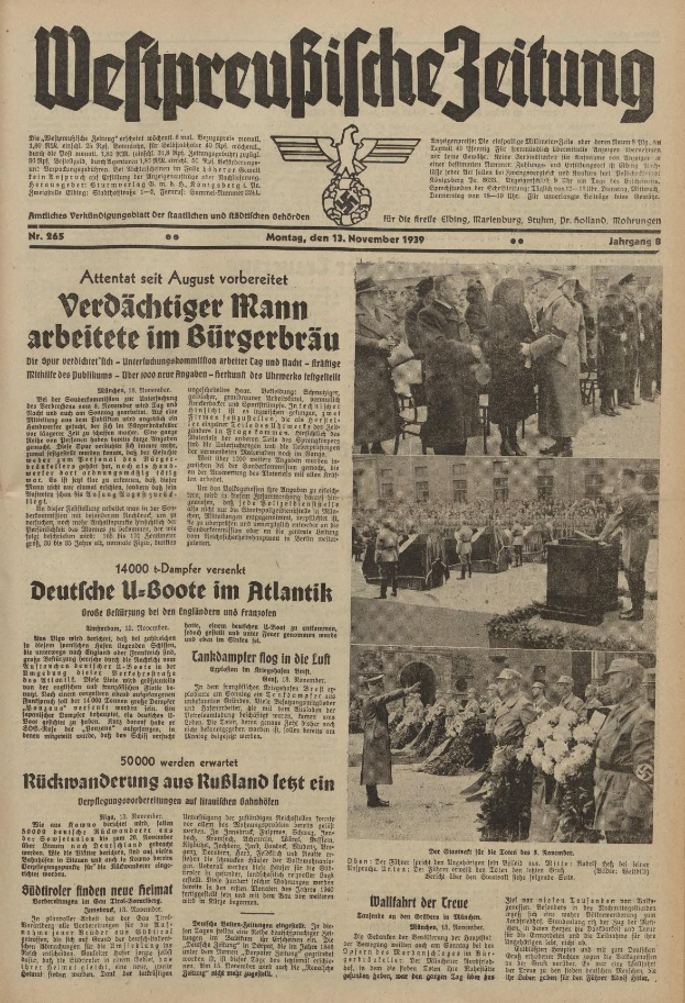 Schwarze-weisse Titelseite einer deutschen Zeitung vom 13. November 1939, betitelt 'Weitpreubliche Zeitung', mit einer Gruppe von Menschen in traditioneller deutscher Tracht auf einem Fest.