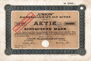 Ein altes deutsches Banknoten mit einem roten Stempel und Text, der darauf hinweist, dass es sich um einen Aktienschein handelt.