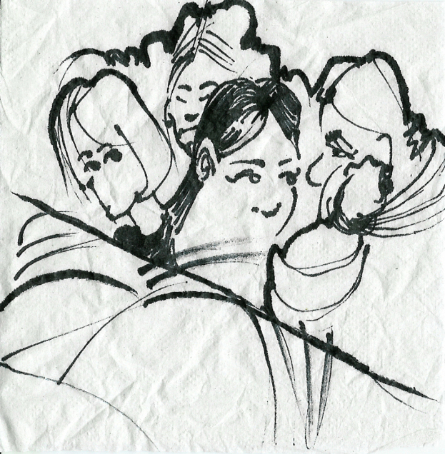 Graffiti oder eine Skizze auf einer weißen Wand.