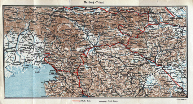Ein detaillierter alter Stadtplan von Marburg, Deutschland, der Straßen, Gebäude und Sehenswürdigkeiten zeigt, mit Text oben und unten.